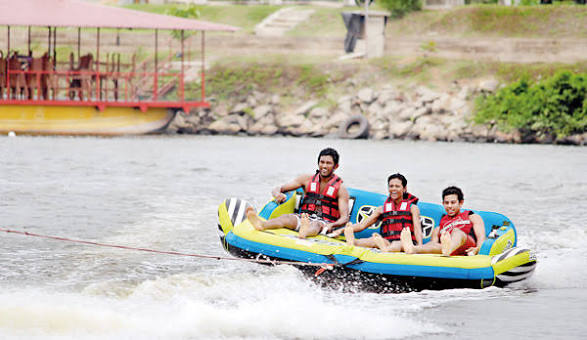 Water sports and serene beach lagoon in Bentota